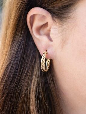 NWOT Lovely 18k gold plated, braided style hoop earrings. Bloomingdale’s